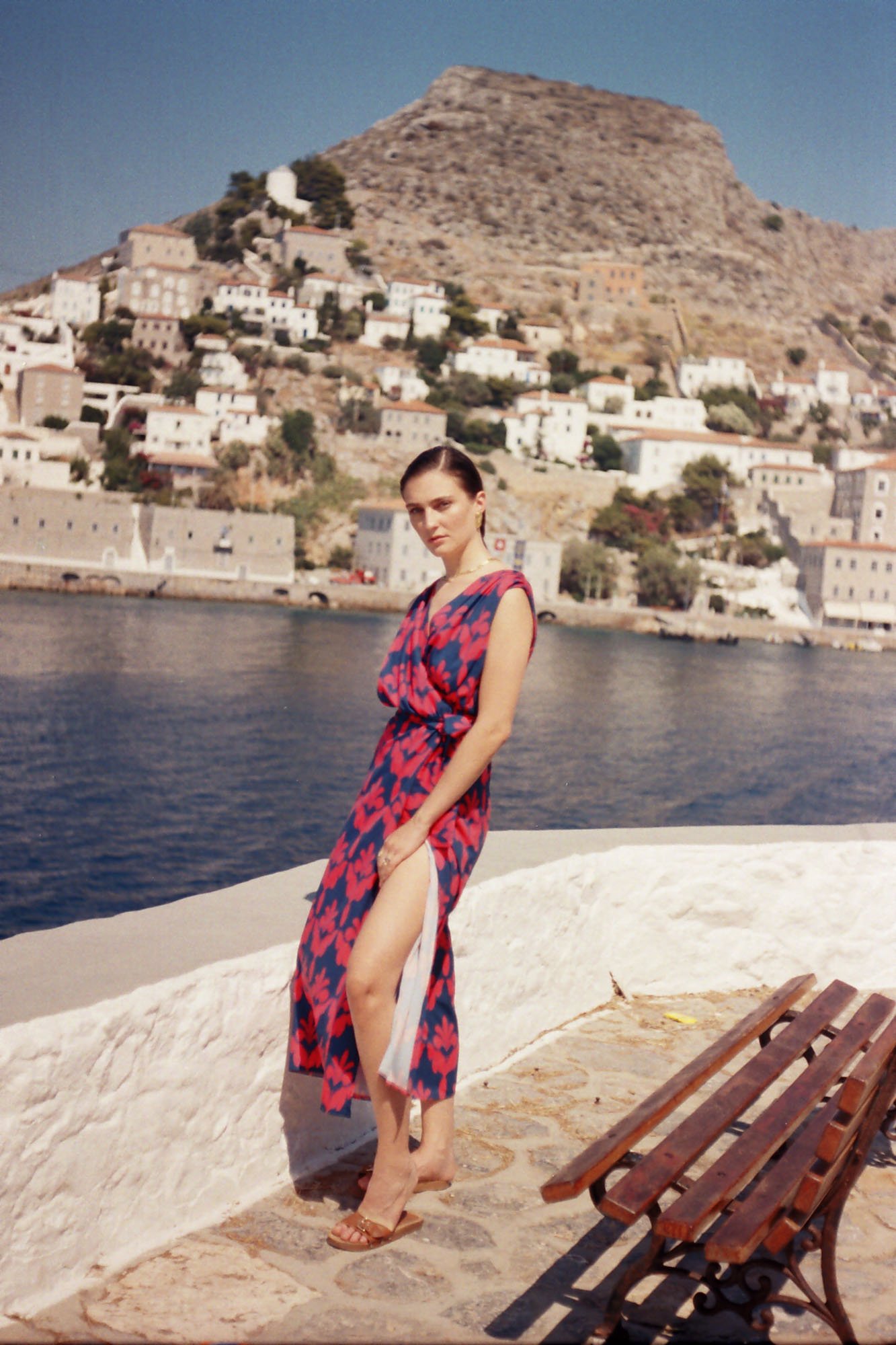 Girl on a dress close to the sea