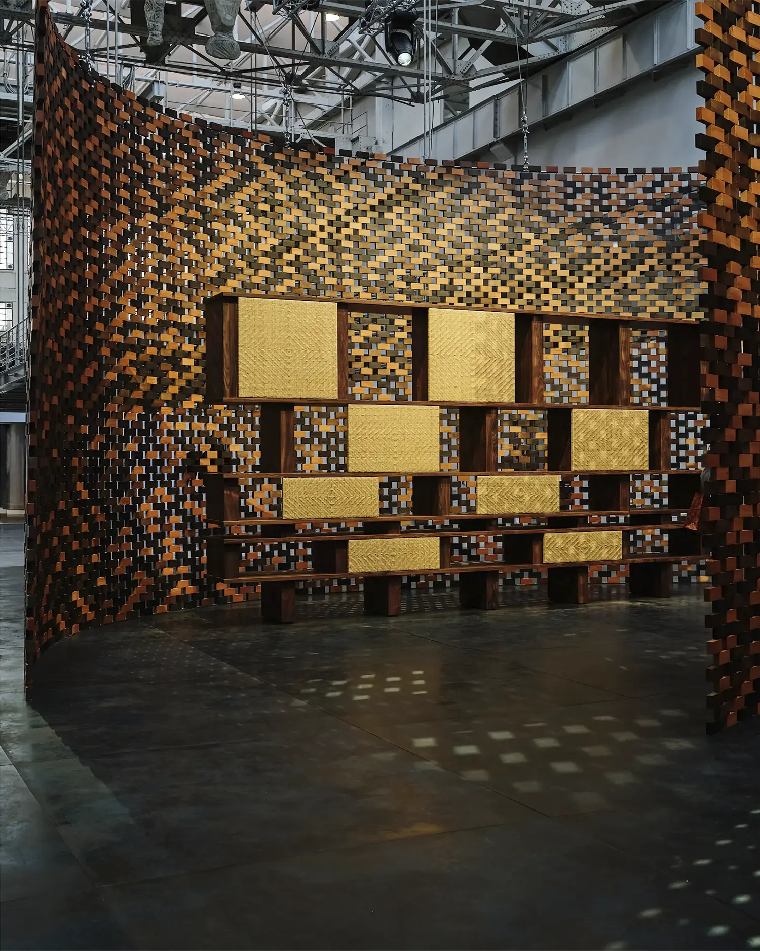 Full view of Charlotte Perriand shelving system inside the Saint Laurent installation