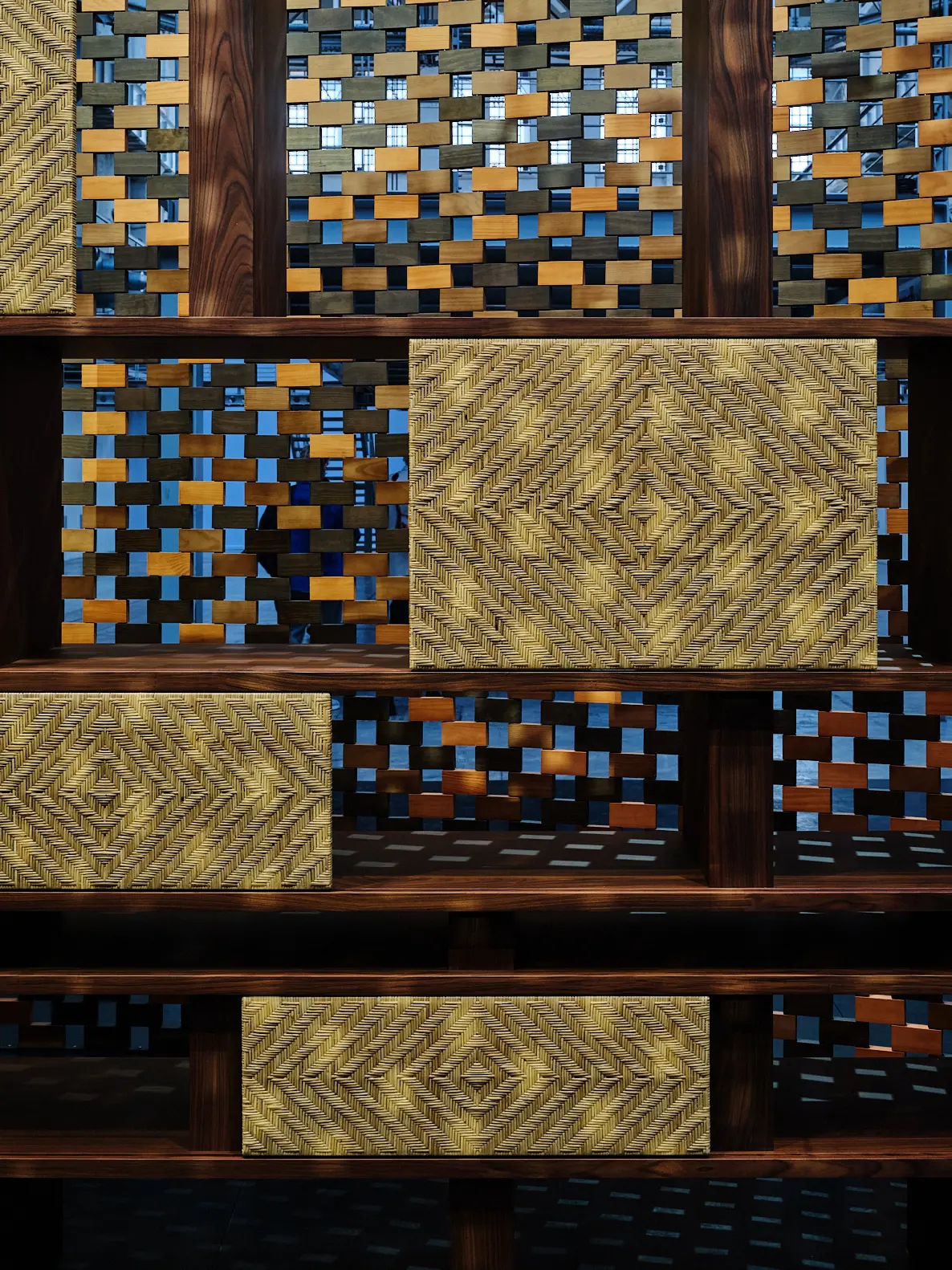 Charlotte Perriand Archive Shelving — Saint Laurent Wooden shelving with woven straw panels from the Charlotte Perriand archive presented by Saint Laurent